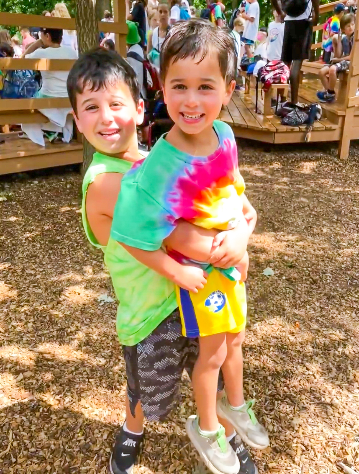Brody and Levi in front of the Bannerama benches // In this post, I'm highlighting the long-lasting traditions, like theme days, that make Banner Day Camp a beloved summer camp in Chicago's North Shore & beyond.