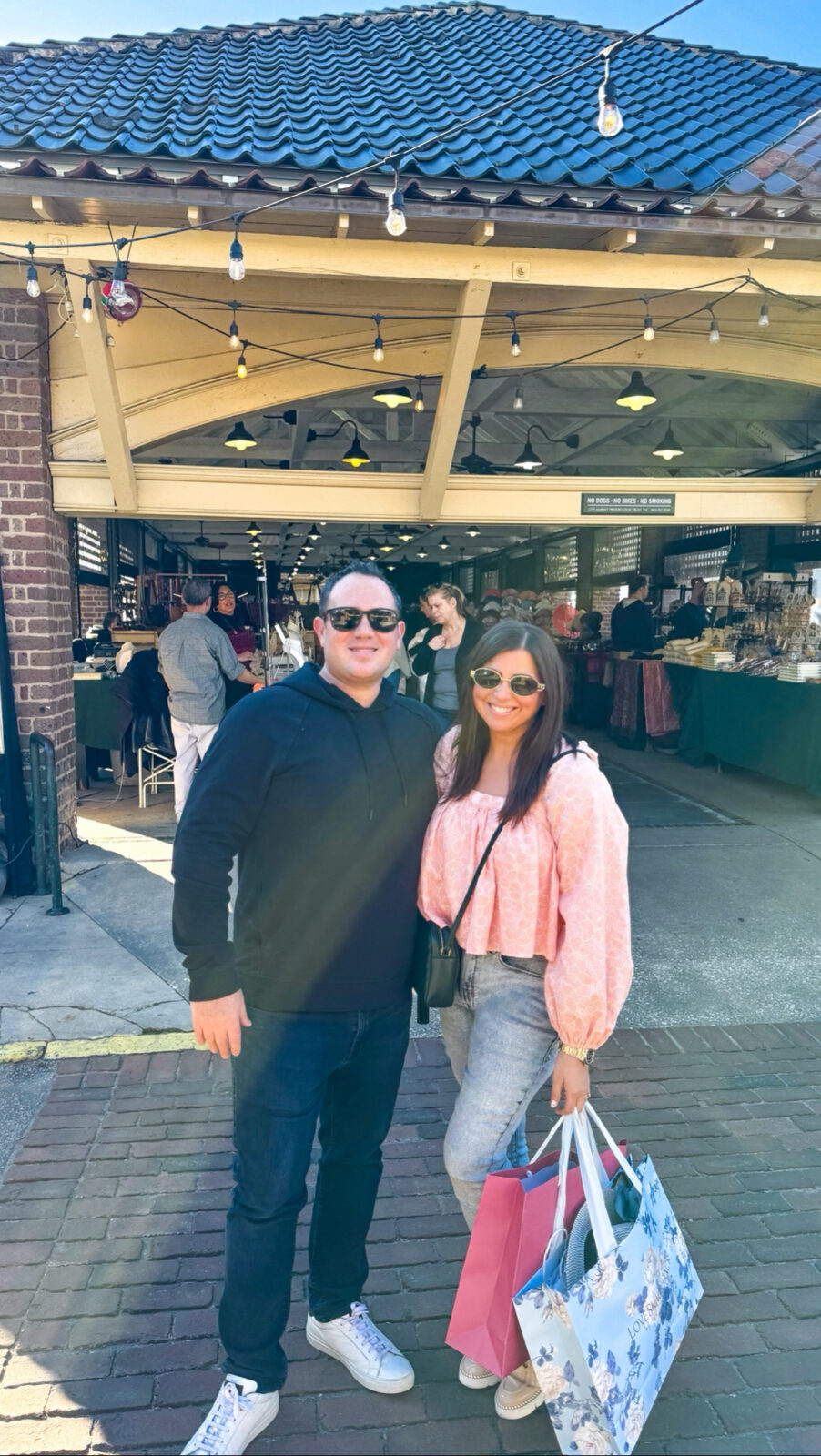 Standing in front of the Charleston City Market